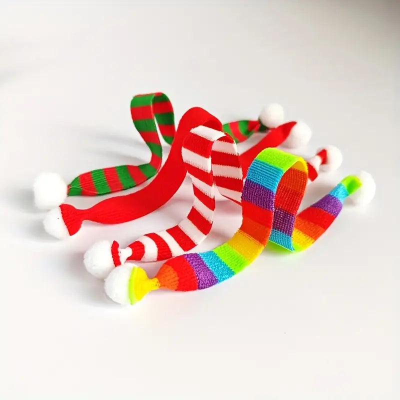 Colorful elf sized scarfs on a white background