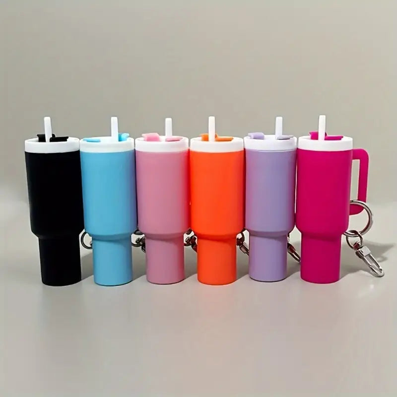 Colorful mini tumblers on a light gray background