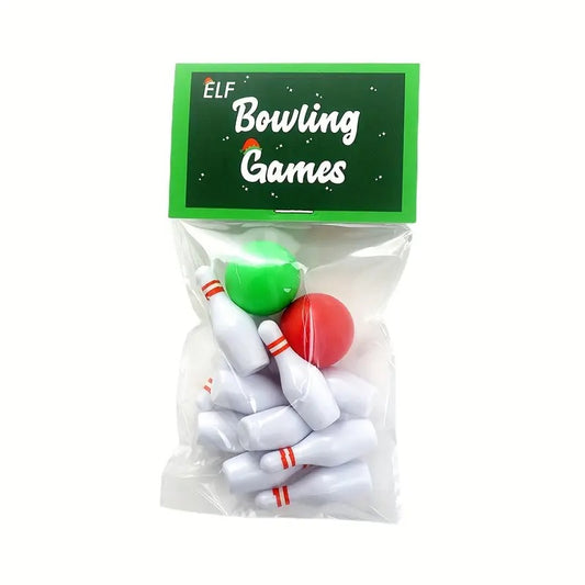 A packaged Elf Bowling Set containing white miniature bowling pins and a red bowling ball with a green label on top labeled 'Elf Bowling Games'.