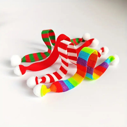 Colorful elf sized scarfs on a white background